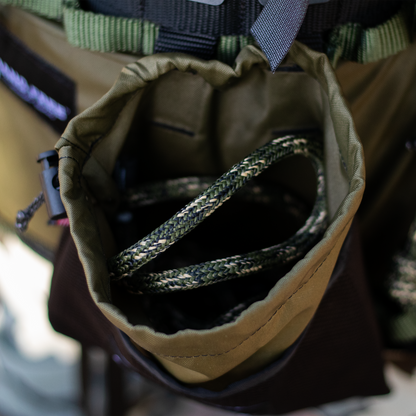 Predator Tether peaking out of Hang Free Saddle Bag