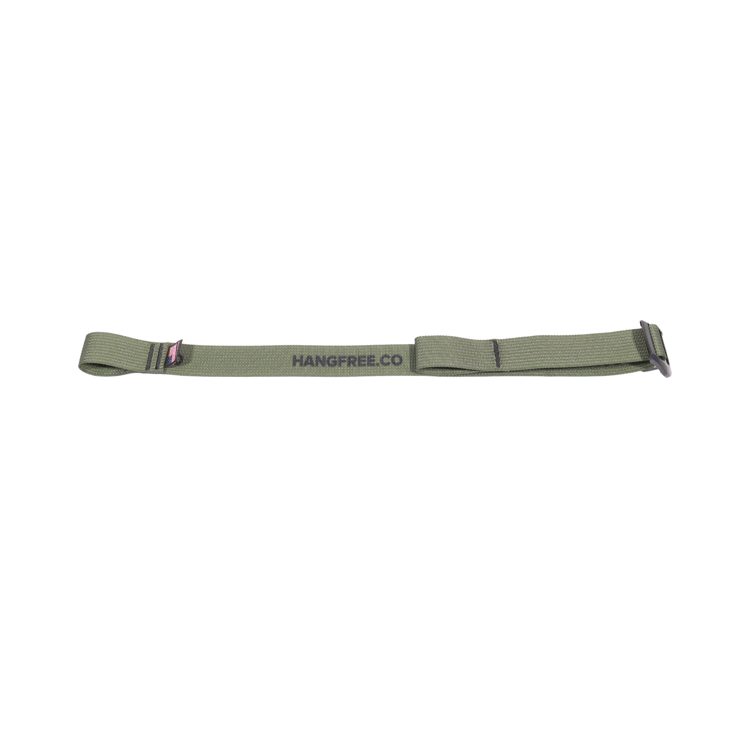 Climbing stick compression strap laying flat on ground.