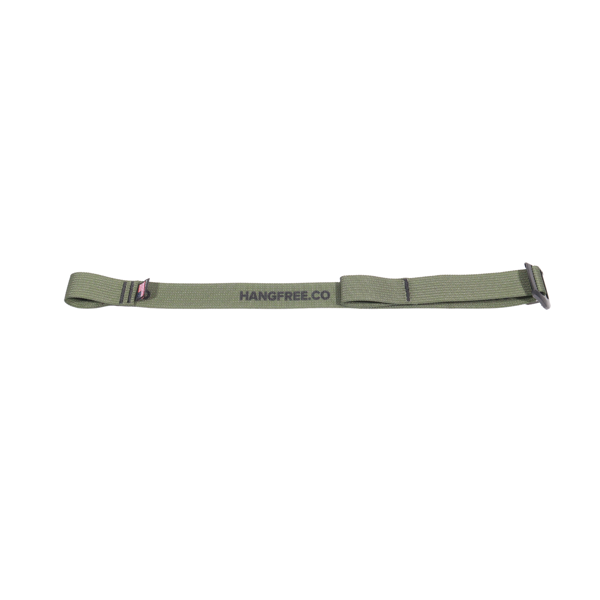 Climbing stick compression strap laying flat on ground.