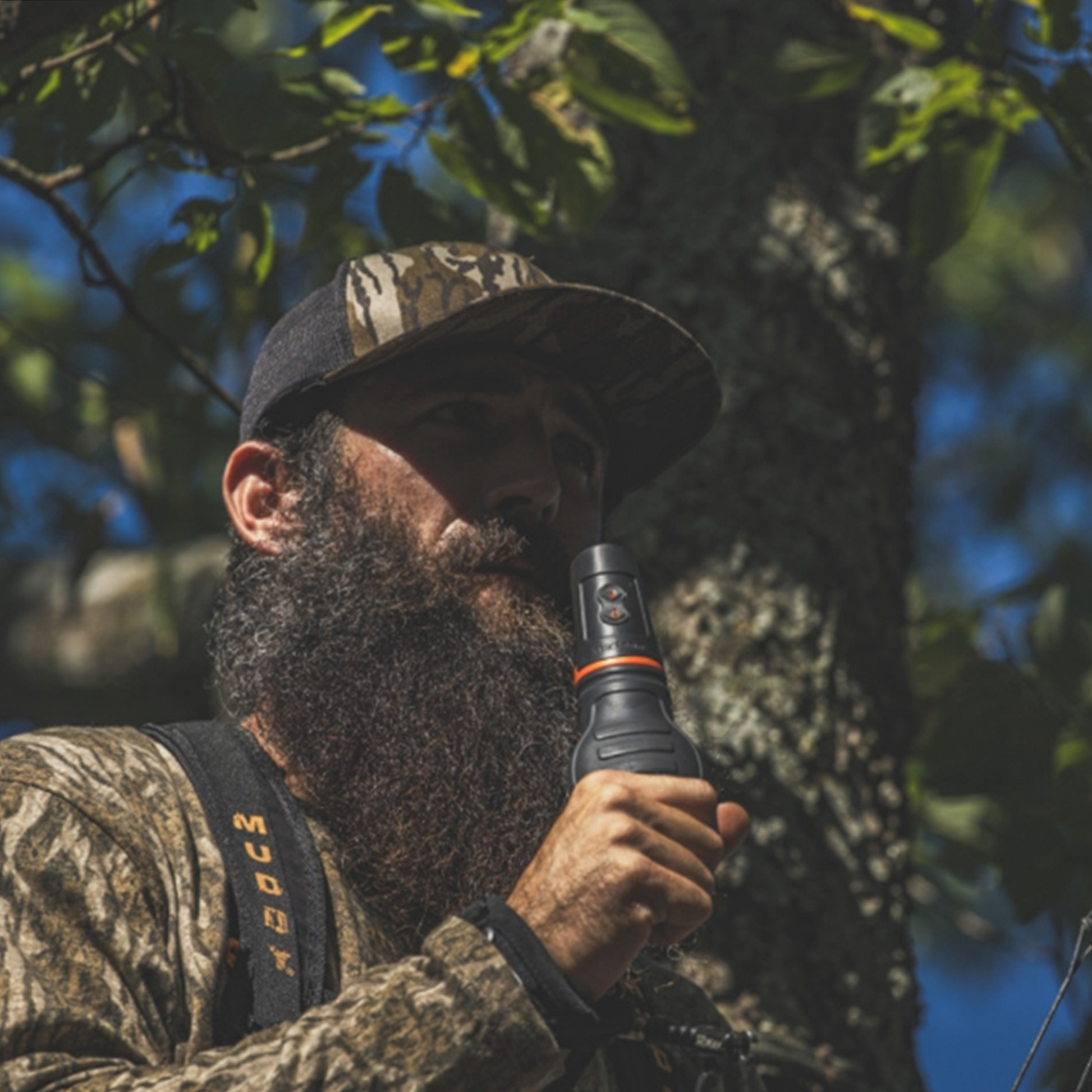 Man Holding Grunt'R while in tree