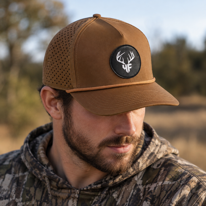 HF Brown Snapback Hat on Hunters Head In Woods